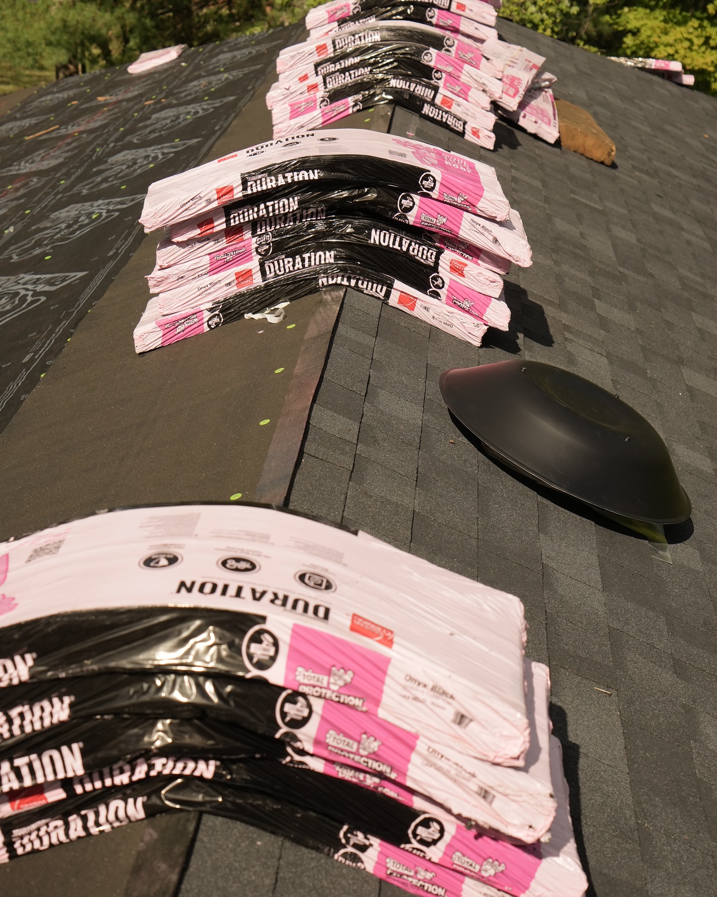 Owens Corning Duration shingles staged on a Mariemont roof during replacement