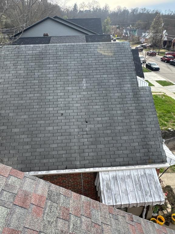 Storm damaged roof in Cincinnati needing emergency repair
