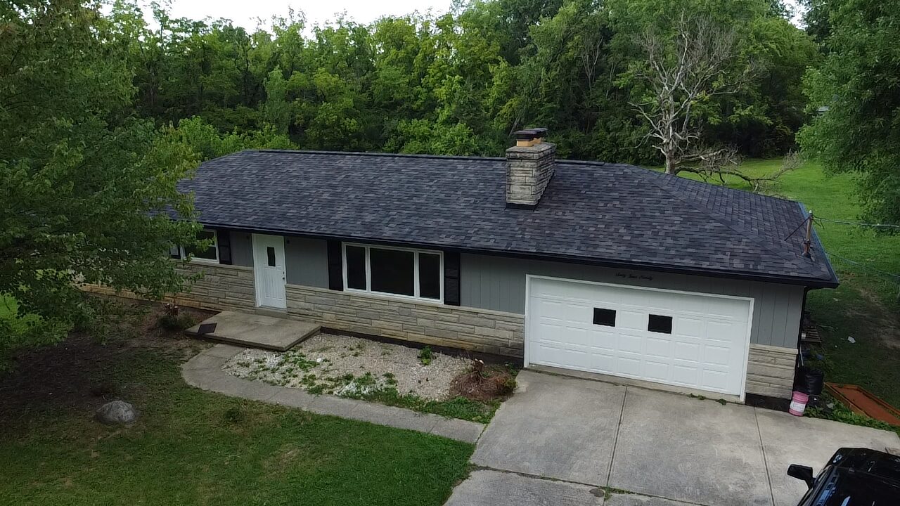 Before photo of a ranch home roof replacement project near Mason
