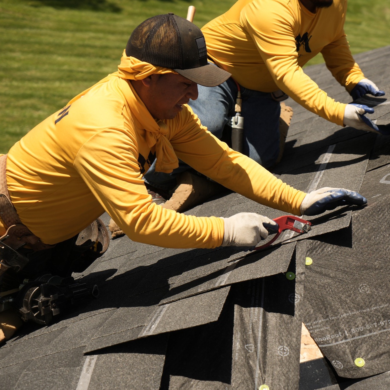 Rooftop Relief crew installing shingles