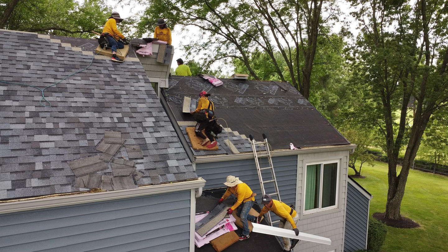 Aerial view of Rooftop Relief crew on a roof replacement